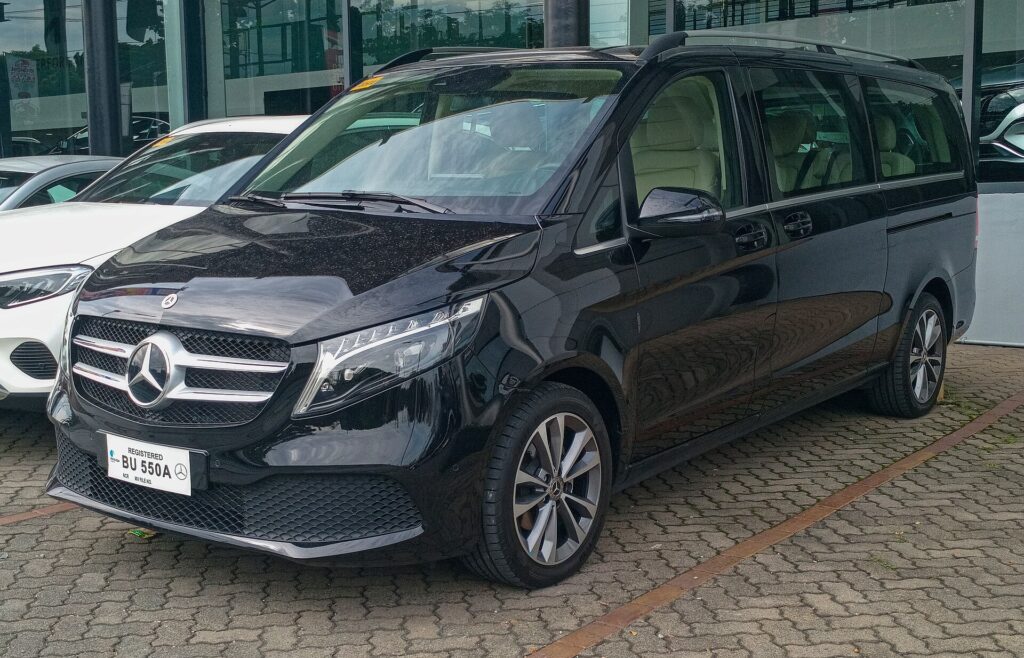 Modern black Mercedes V-Class for group delegates and luggage during Paris events