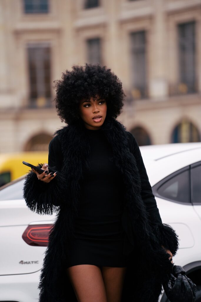Didi Stone wearing elegant black street style at Place Vendôme in Paris