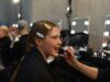 The Faces Fashion Can’t Look Away From: 2026’s Most Influential Models Gigi Hadid preparing backstage before a Prada runway show