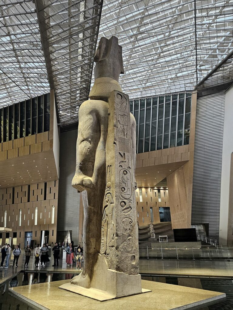 Colossal Ramesses II statue in the modern Grand Hall of the Grand Egyptian Museum