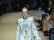 Inside Paris Fashion Week 2026: Dates, Venues & the Luxury Visitor Guide Model Jean Campbell walking an Alexander McQueen runway at Paris Fashion Week