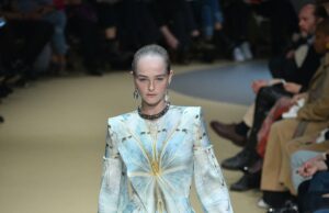 Inside Paris Fashion Week 2026: Dates, Venues & the Luxury Visitor Guide Model Jean Campbell walking an Alexander McQueen runway at Paris Fashion Week