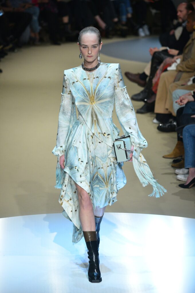 Model Jean Campbell walking an Alexander McQueen runway at Paris Fashion Week