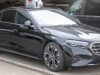 When Paris Gets Busy, One Car Is Not Enough: Inside the Chauffeur Fleets Moving Major Events Modern black Mercedes E-Class with other premium vehicles in a Paris chauffeur fleet