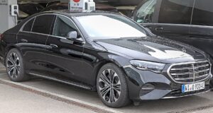 When Paris Gets Busy, One Car Is Not Enough: Inside the Chauffeur Fleets Moving Major Events Modern black Mercedes E-Class with other premium vehicles in a Paris chauffeur fleet