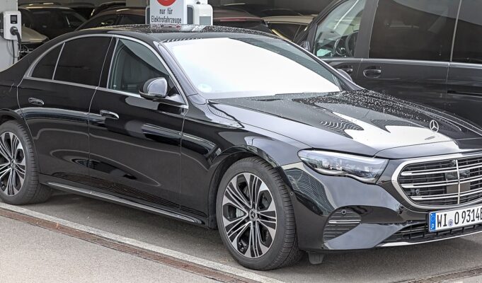 When Paris Gets Busy, One Car Is Not Enough: Inside the Chauffeur Fleets Moving Major Events Modern black Mercedes E-Class with other premium vehicles in a Paris chauffeur fleet