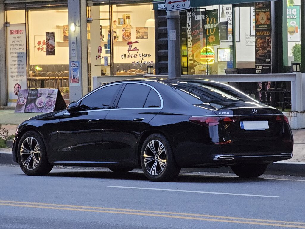 Current-generation black Mercedes E-Class used for executive and airport chauffeur transfers