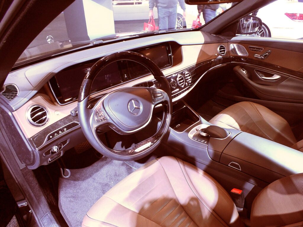 Clean premium Mercedes S-Class interior for a luxury airport transfer to Paris