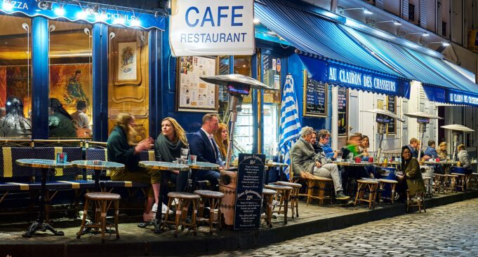 Café Terraces in Montmartre People enjoying café terraces in Montmartre, Paris