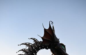 Is Disneyland Paris Really Worth It? What First-Time Visitors Need to Know Maleficent dragon breathing fire during the Disneyland Paris parade