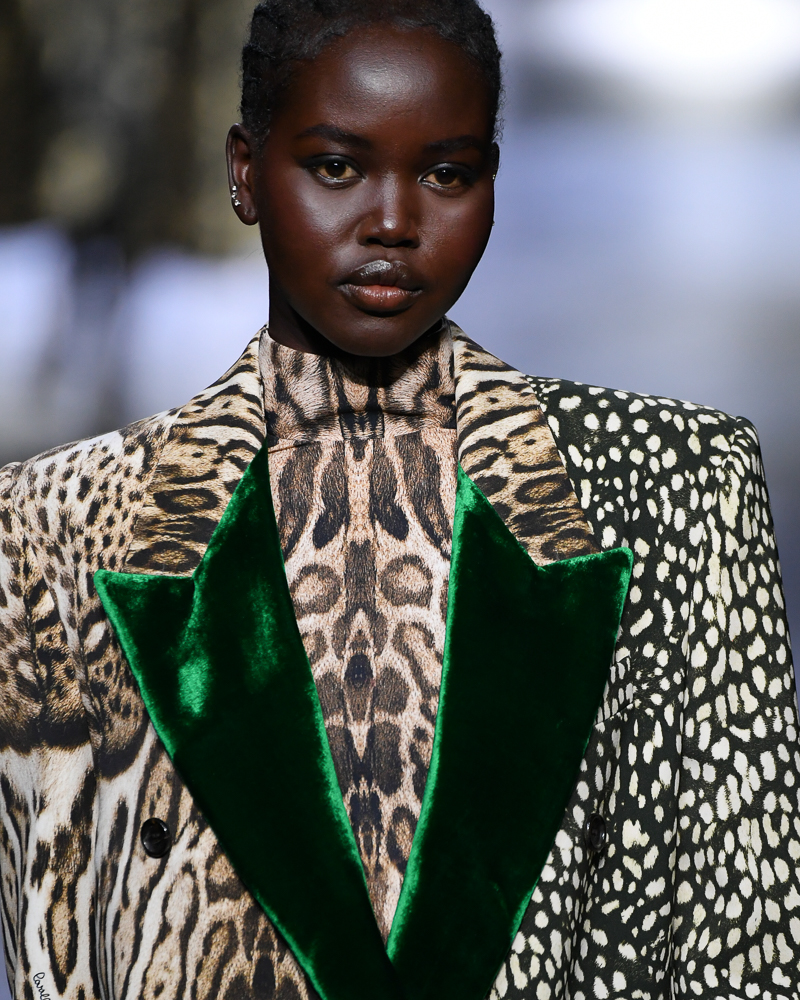 Adut Akech wearing a sculptural animal-print Roberto Cavalli runway look