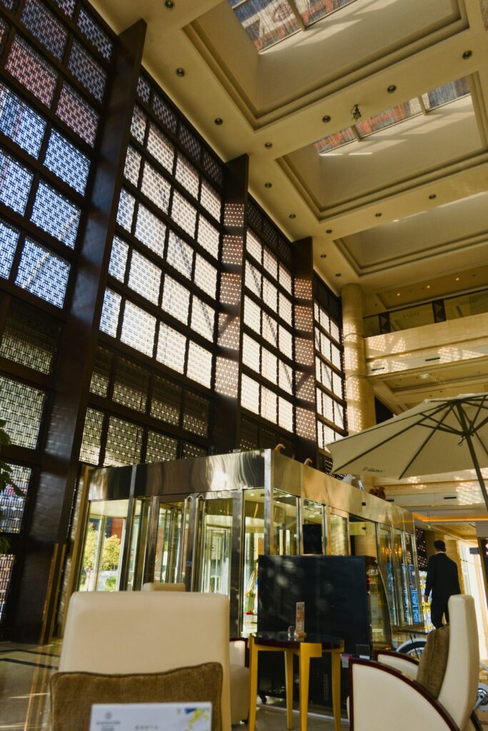 Modern luxury hotel lobby illustrating technology-driven hospitality and trusted service