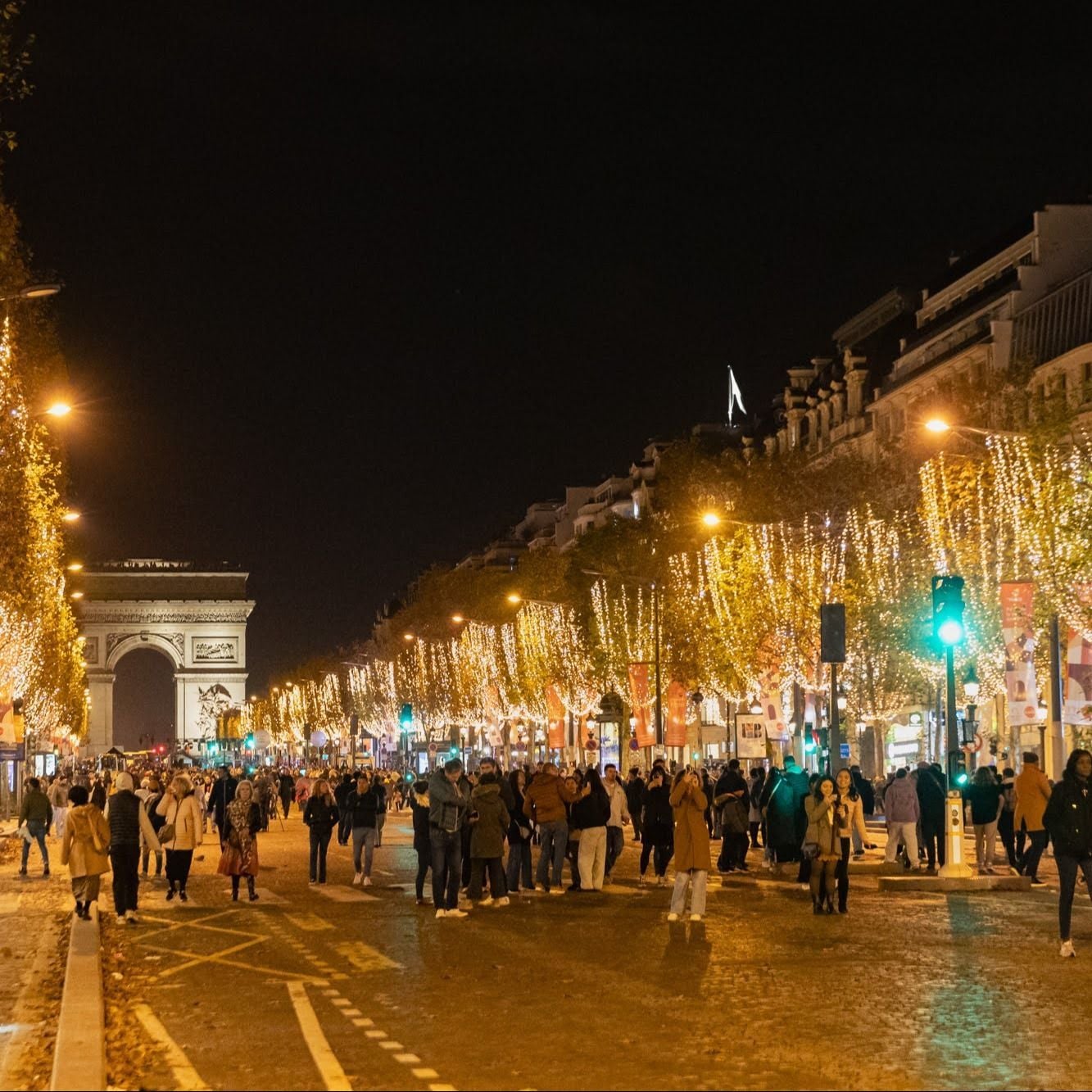 Illuminated Champs-Élysées in Paris, a center of tourism and luxury retail