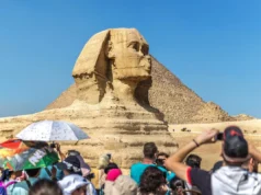 What If One Decision Could Bring Millions More Tourists to Egypt? Could Electronic Visas Transform Egyptian Tourism? International tourists photographing the Great Sphinx of Giza for Egypt e-Visa travel
