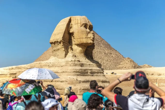 International tourists photographing the Great Sphinx of Giza for Egypt e-Visa travel