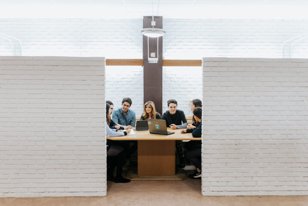 Hospitality students collaborating in an ESSEC campus study room