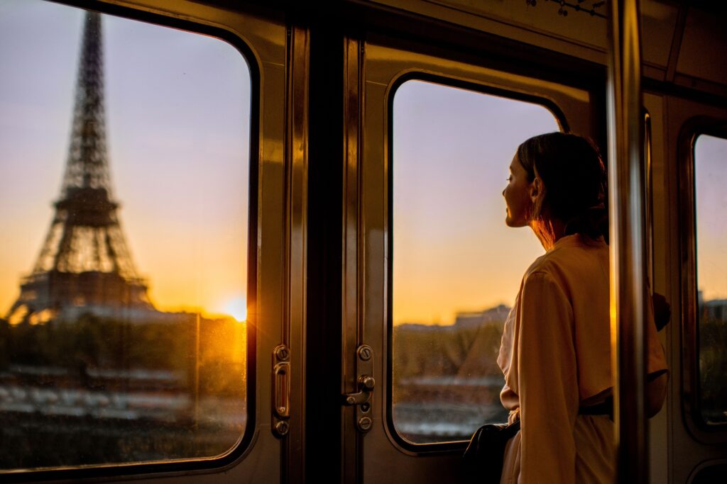 International visitor near the Eiffel Tower during Europe summer tourism in 2026