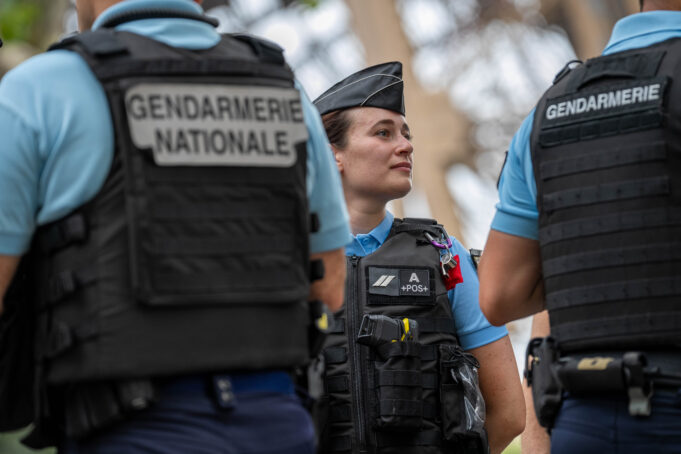 French Gendarmerie near the Eiffel Tower French Gendarmerie officers near the Eiffel Tower in Paris