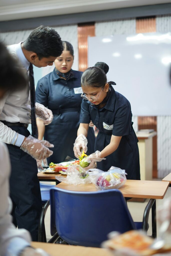 Hospitality students developing practical culinary and service skills in training