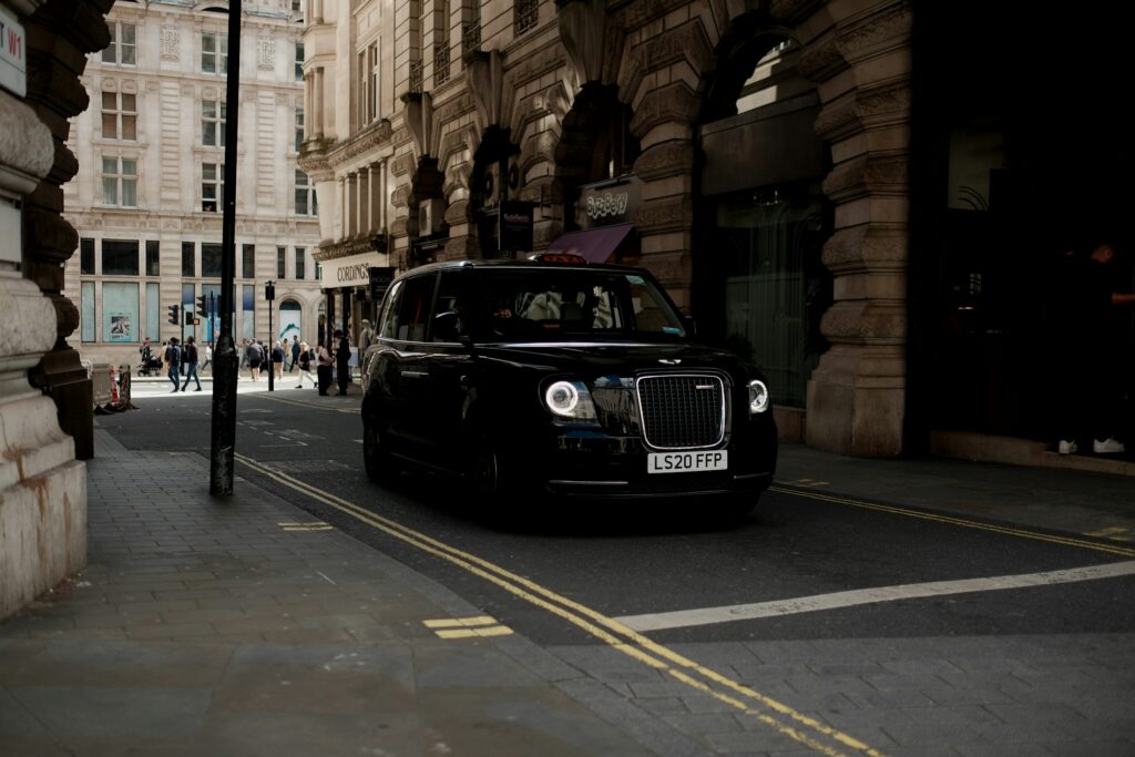 Modern licensed London black cab showing regulated and accessible tourism transport