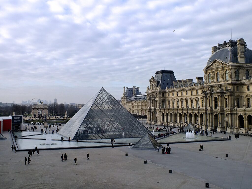 Visitors outside the Louvre Pyramid in Paris, ranked first in the Museum Power Index 2026