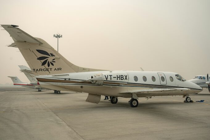 Modern private jet on an airport tarmac illustrating luxury travel privacy in 2026