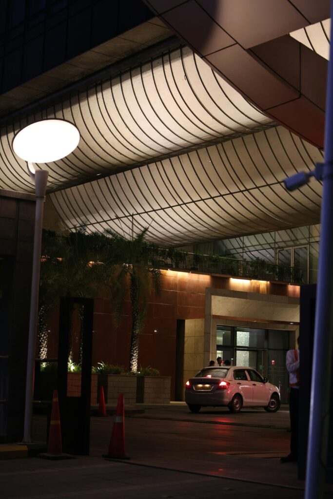 Modern vehicle at a luxury hotel arrival illustrating premium tourism transport quality