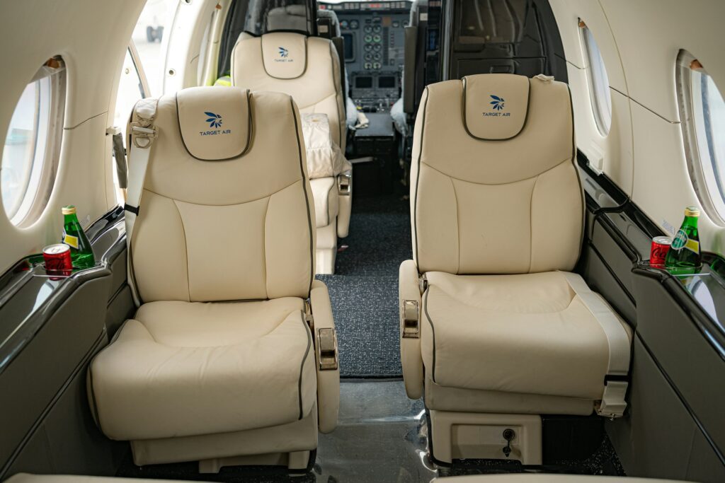 Modern private jet interior representing private aviation and high-value luxury travel
