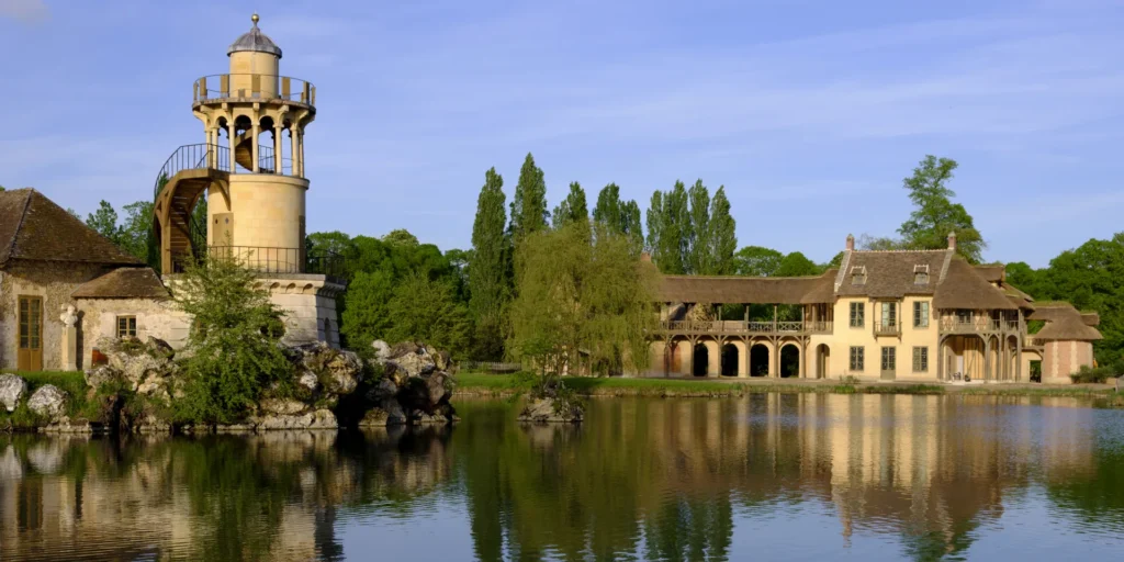 Queen's Hamlet cottages beside the lake in the Trianon Estate at Versailles