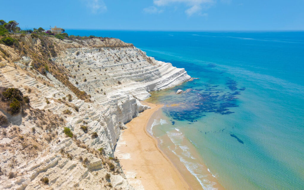 Sicily Mediterranean coastline representing resilient Italian tourism in 2026