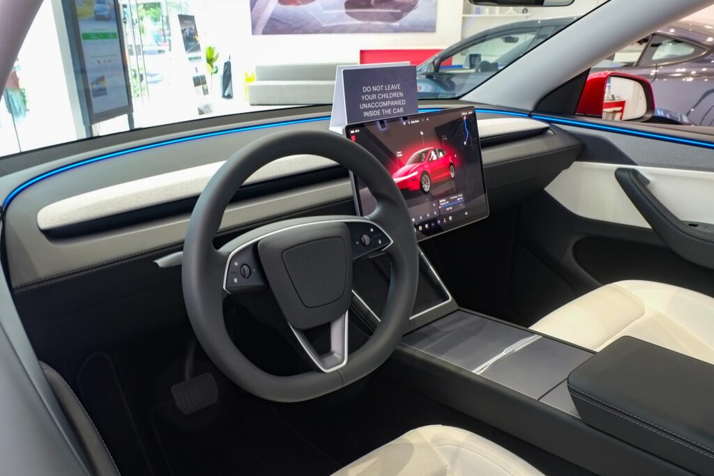 2025 Tesla Model Y interior and central screen used for supervised driver assistance