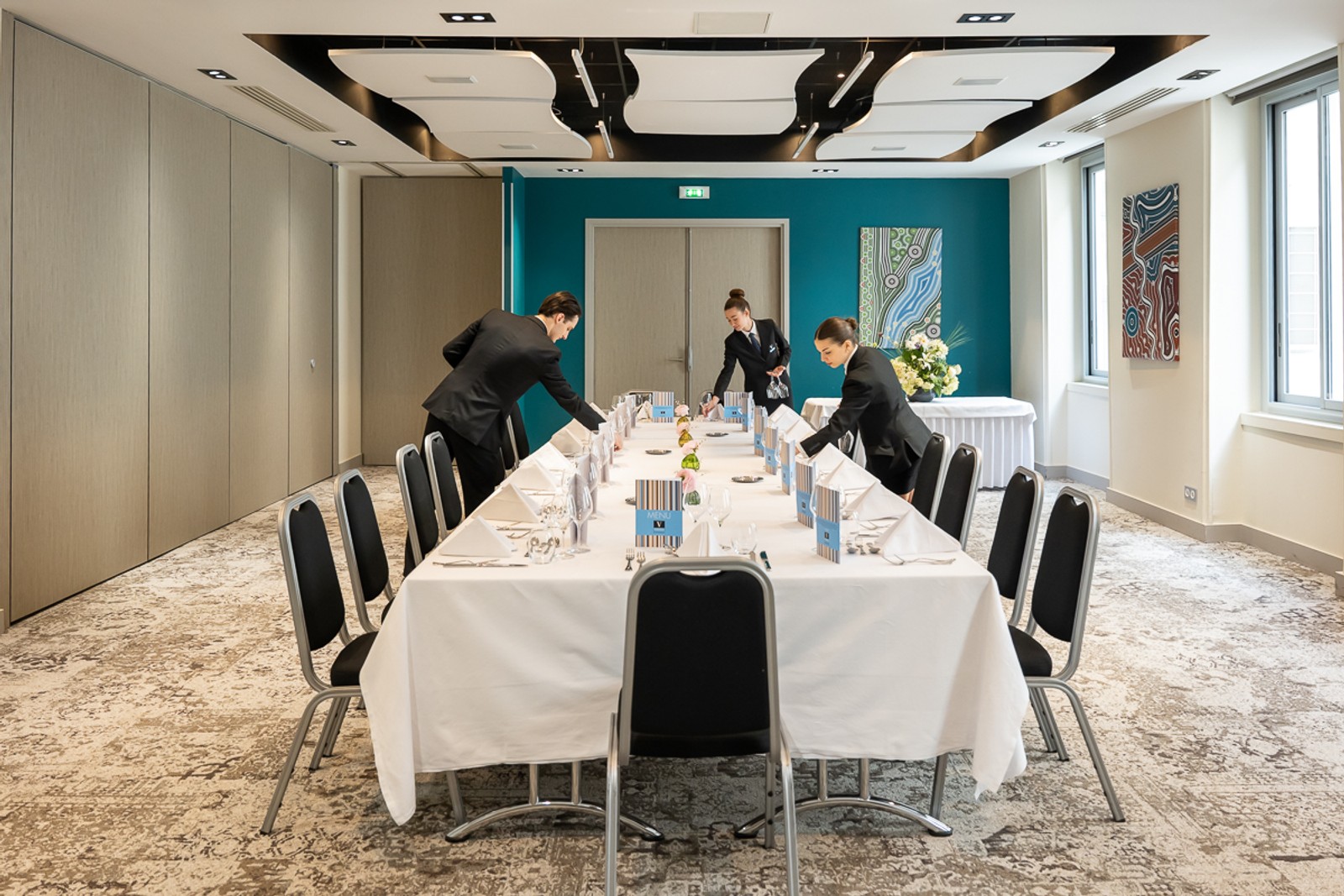 Vatel Paris students preparing a seminar room at the La Défense hospitality campus