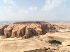 AlUla: Could Saudi Arabia Build the Middle East’s Next Global Tourism Capital? Hegra rock-cut tombs in AlUla Saudi Arabia, an official Royal Commission for AlUla media image used to illustrate the destination investment analysis.