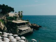 The Best Tourist Cities in France, Ranked by OUISTARS Visitors overlooking the Mediterranean coast and city terraces in Nice, France