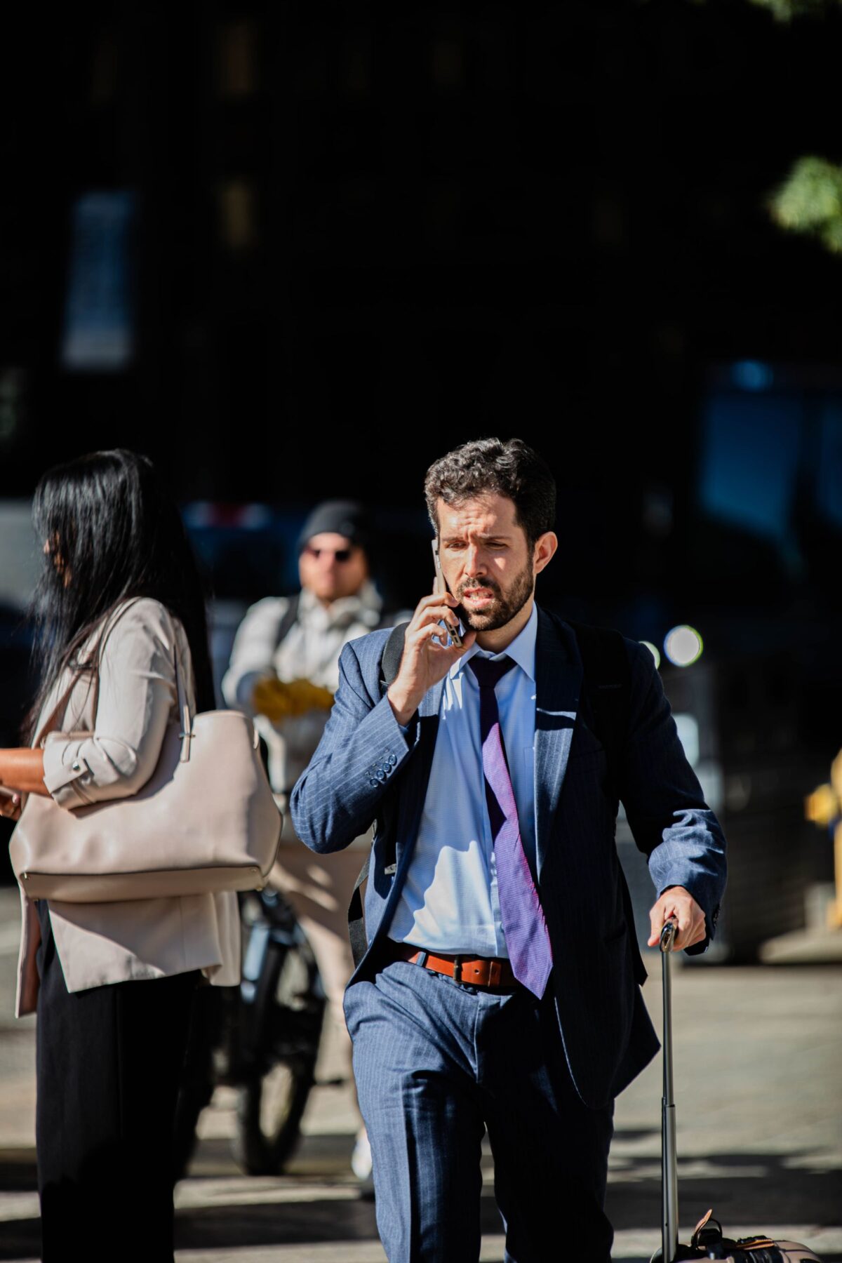 Illustrative business traveller calling for local hotel assistance after arrival