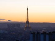 The Eiffel Tower Had an Expiry Date. The Signal That Saved Paris’s Icon Eiffel Tower rising above the Paris skyline at sunset in 2026
