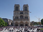 The Night Notre-Dame Nearly Fell: Inside the Fire and the 860-Year Fight to Save It Restored Notre-Dame de Paris with visitors on the parvis after reopening