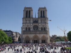 The Night Notre-Dame Nearly Fell: Inside the Fire and the 860-Year Fight to Save It Restored Notre-Dame de Paris with visitors on the parvis after reopening