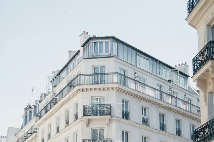 OUISTARS hero — A Paris hotel building on a busy central street in 2025 A Paris hotel building on a busy central street in 2025
