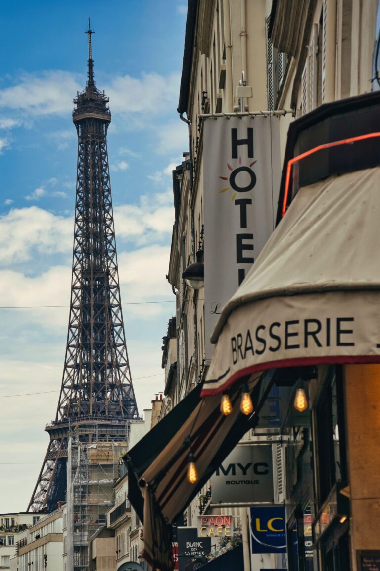 A Parisian street and the Eiffel Tower: luxury travel is personal time in a global city.
