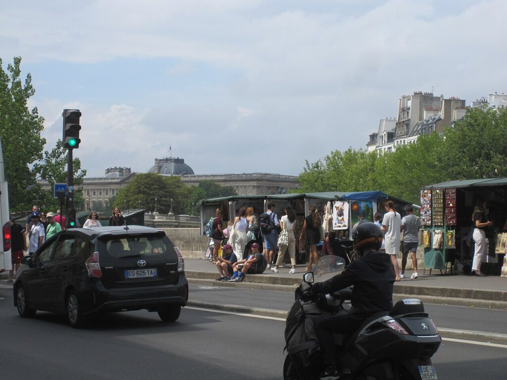 Mixed road traffic on Quai Anatole France in Paris