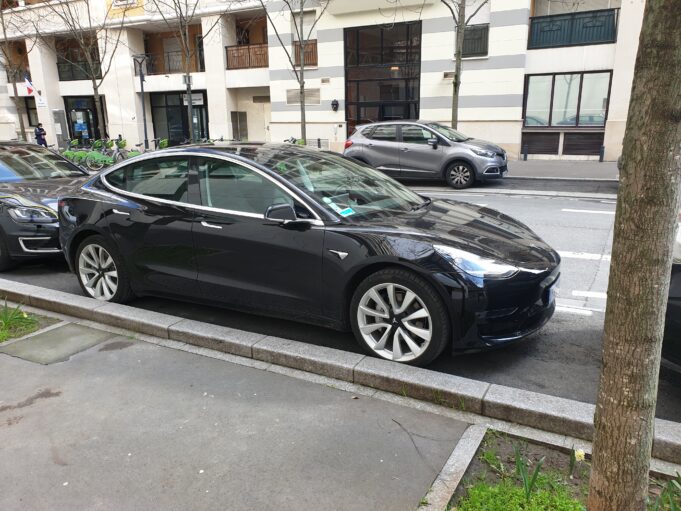 Tesla Model 3 in the Paris area — archival context Tesla Model 3 photographed in the Paris area, illustrating Tesla FSD France context