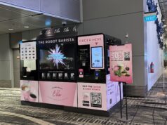 Will AI Transform Tourism — or Replace the People Who Work in It? Robot barista serving travellers at Singapore Changi Airport Terminal 3, illustrating automation in tourism
