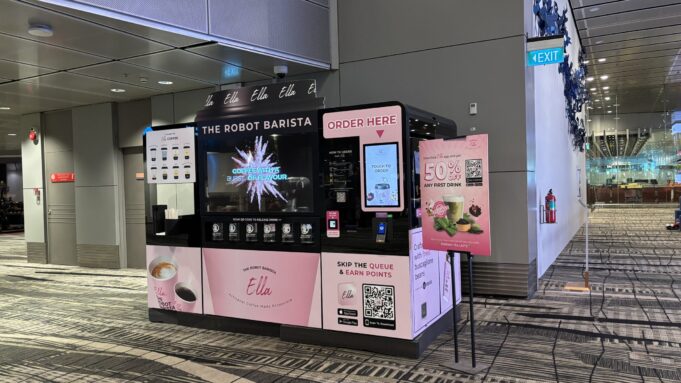 AI in tourism: robot service at Singapore Changi Airport Robot barista serving travellers at Singapore Changi Airport Terminal 3, illustrating automation in tourism