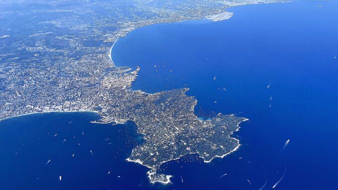 Cap d’Antibes, Antibes and the Baie des Anges from the air Aerial view of Cap d’Antibes, Antibes, the Baie des Anges and Nice Côte d’Azur Airport
