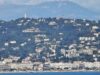 Cannes Events Calendar 2026–2027: Film, Yachts, Luxury Travel and Culture Panoramic view of La Croisette hotels and Cannes hillside residences from the Mediterranean