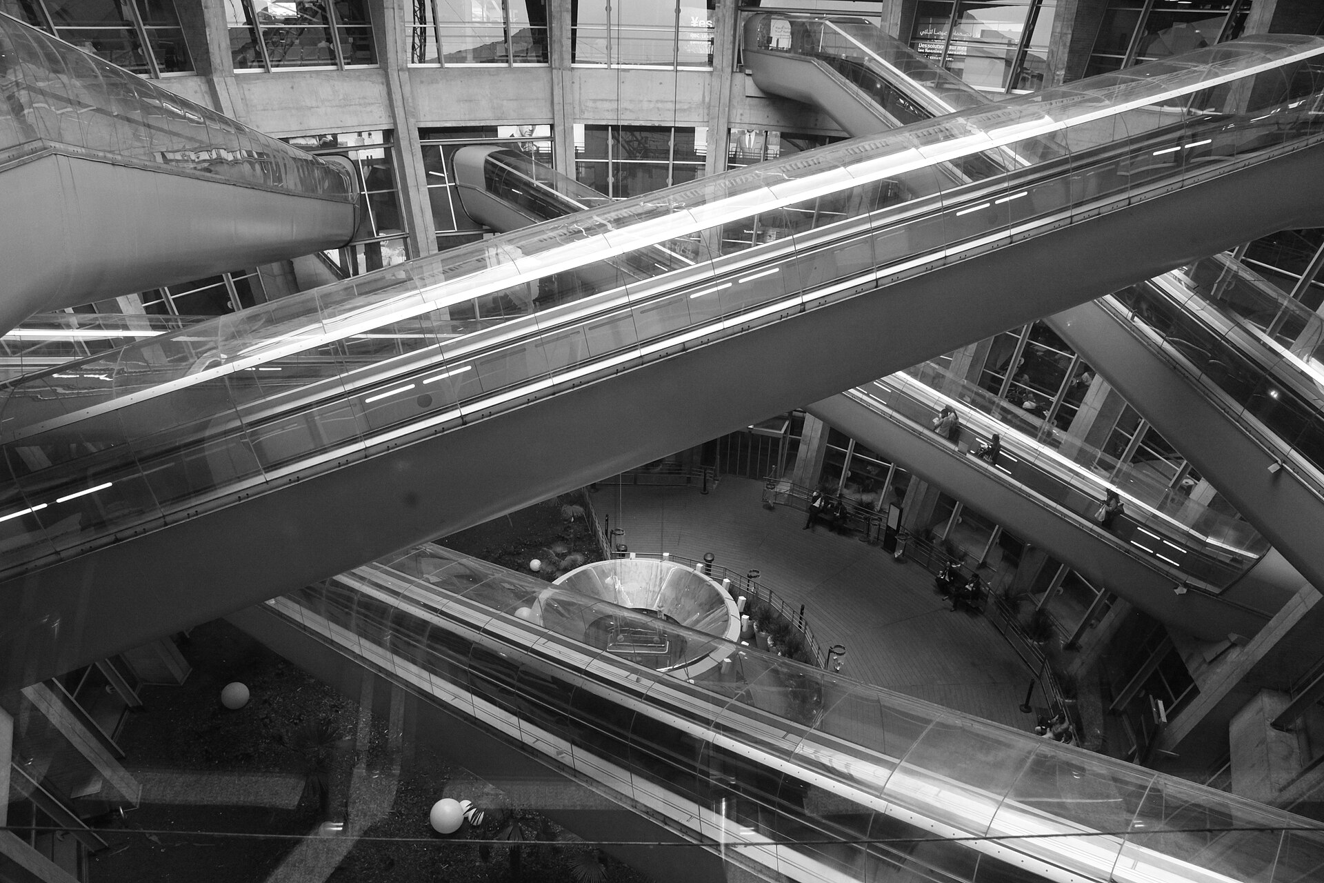 Real interior view of the crossing moving walkways in Terminal 1
