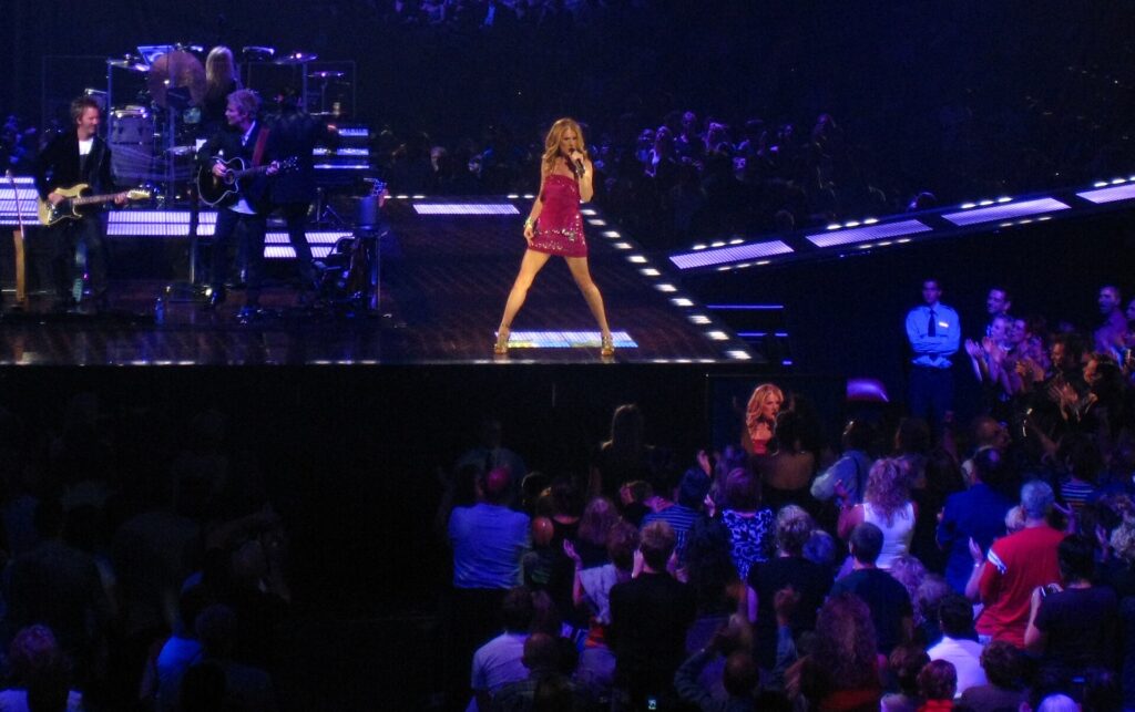 Céline Dion performing on a large concert stage in Montréal in 2008