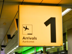The Arrival Clock: How Long Does It Really Take to Enter Paris, Dubai and Cairo? Airport arrivals corridor symbolising the journey from aircraft door to the public hall in Paris, Dubai and Cairo