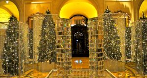 Four Seasons George V: The Palace of Flowers and Its Wartime Secret Four Seasons George V Paris festive lobby